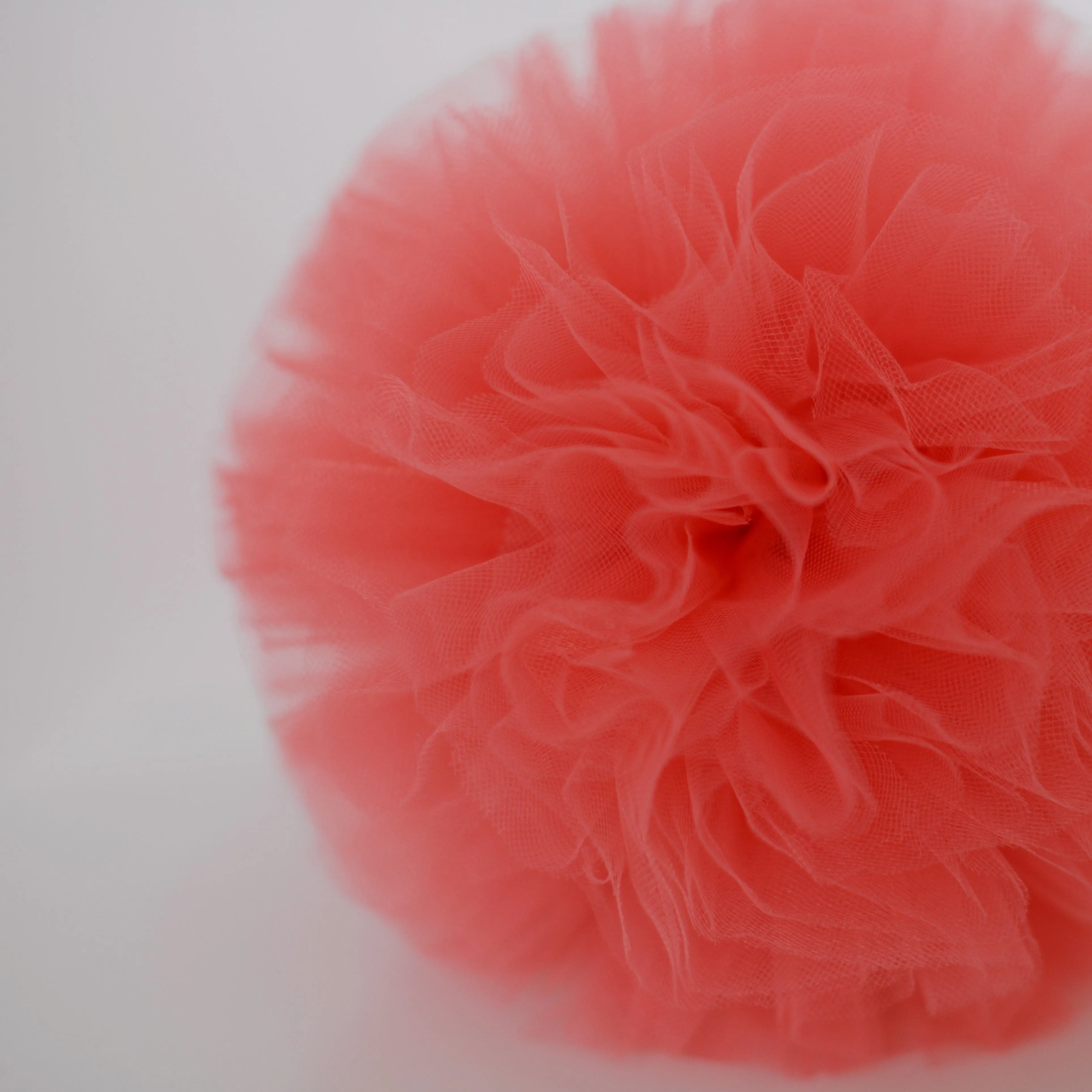 Coral tulle pom pom