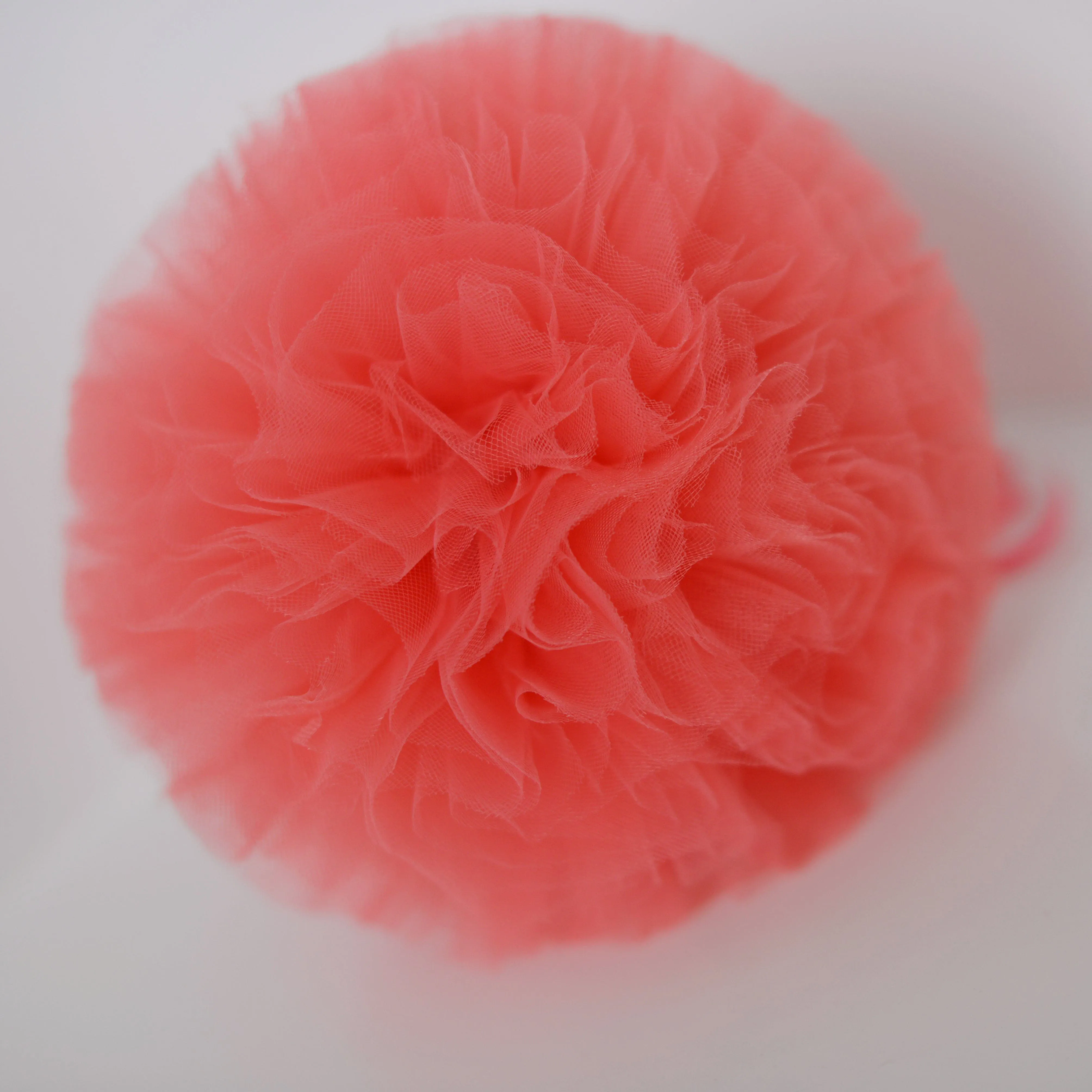 Coral tulle pom pom