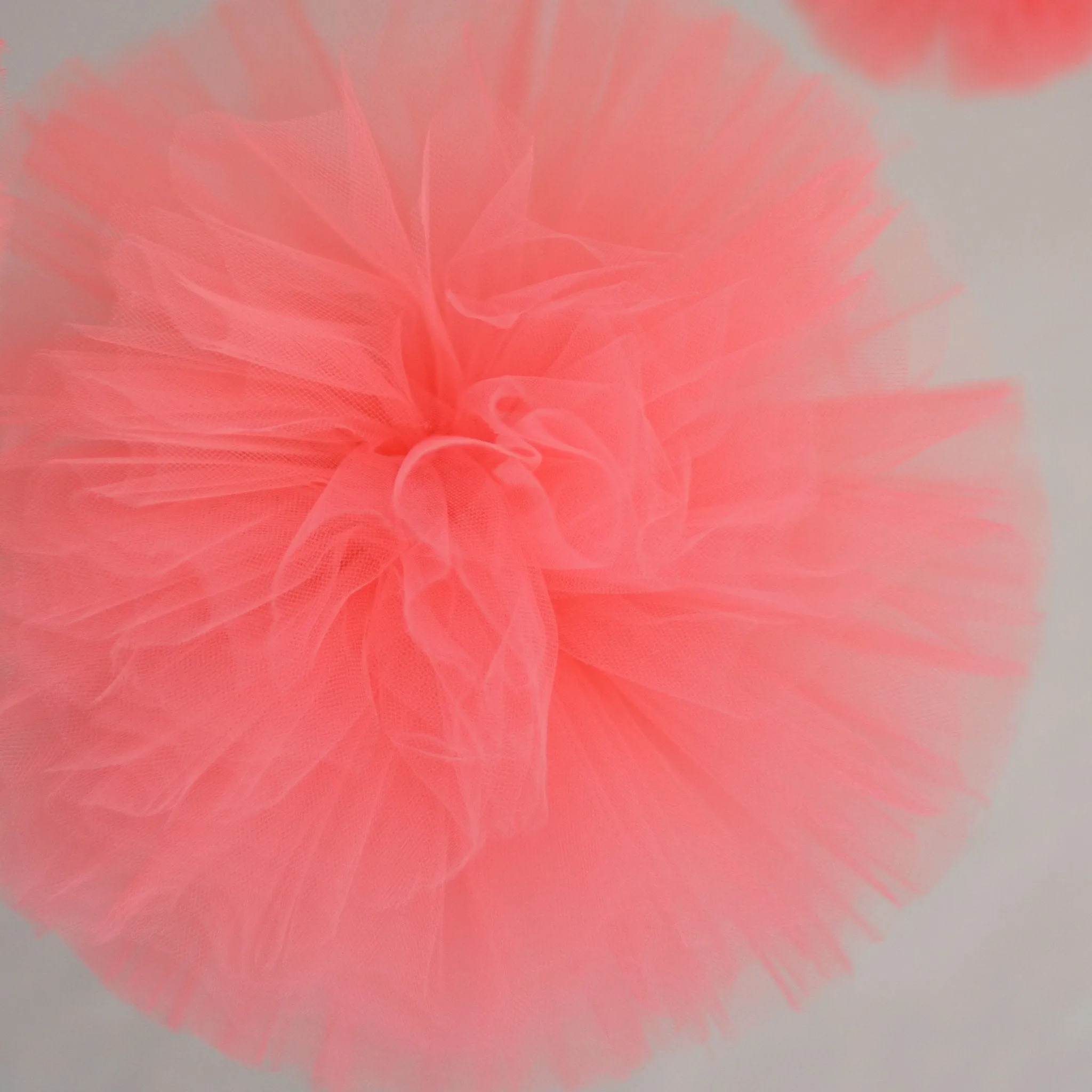 Coral tulle pom pom