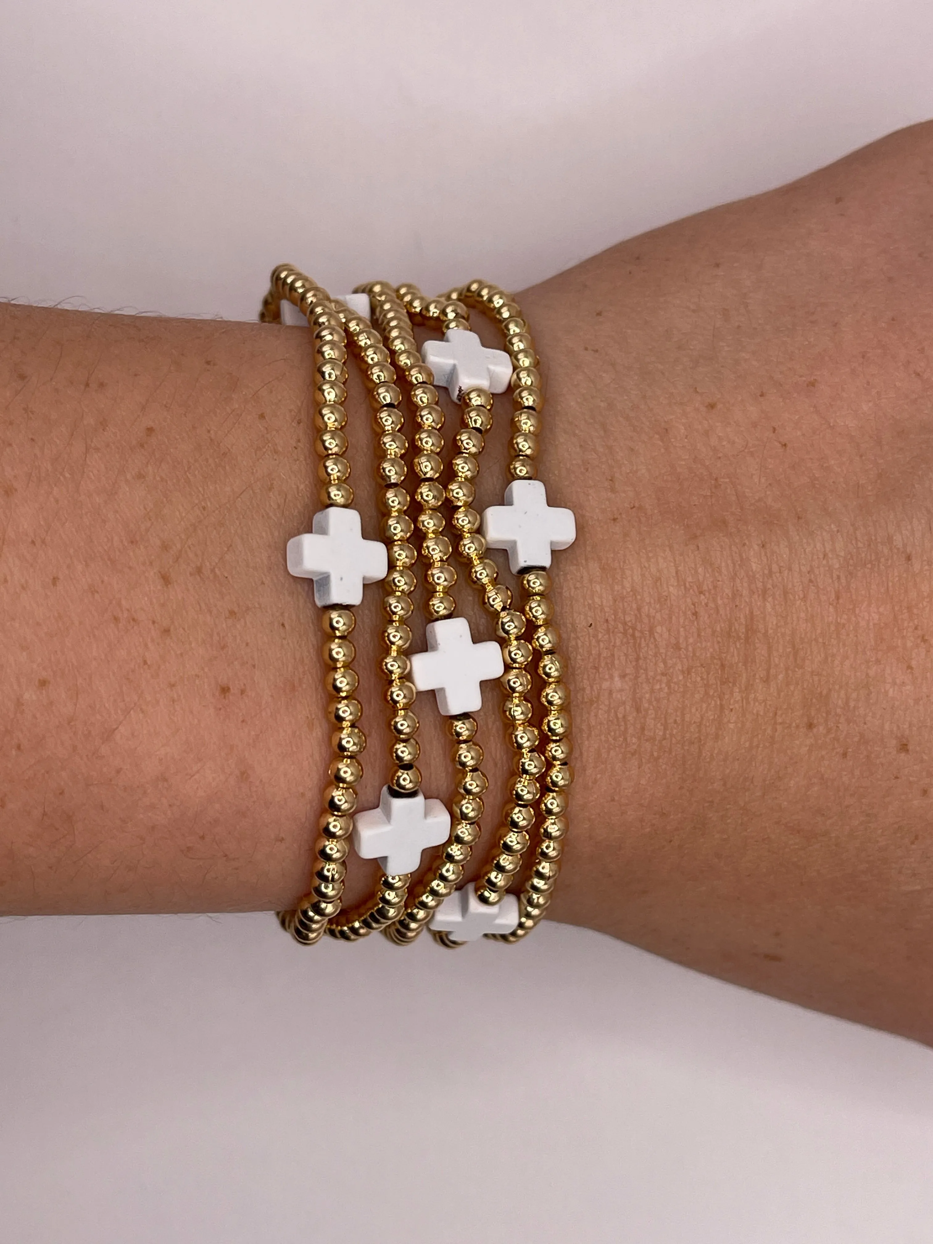 Gold Beaded White Cross Bracelet