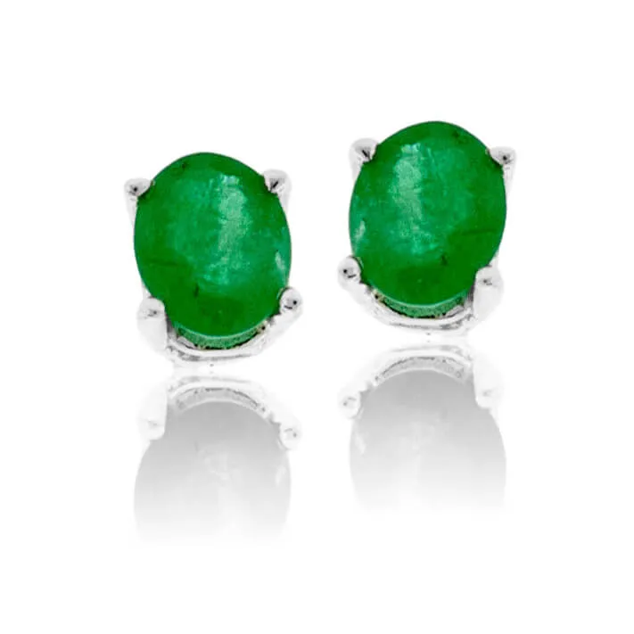 Oval Shaped Emerald White Gold Stud Earrings