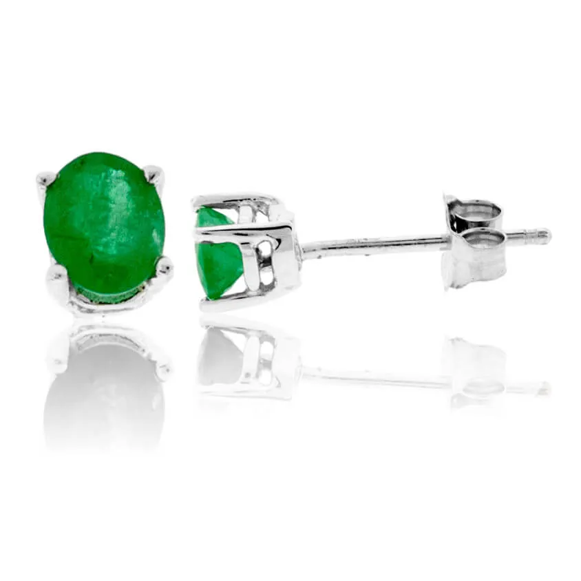 Oval Shaped Emerald White Gold Stud Earrings