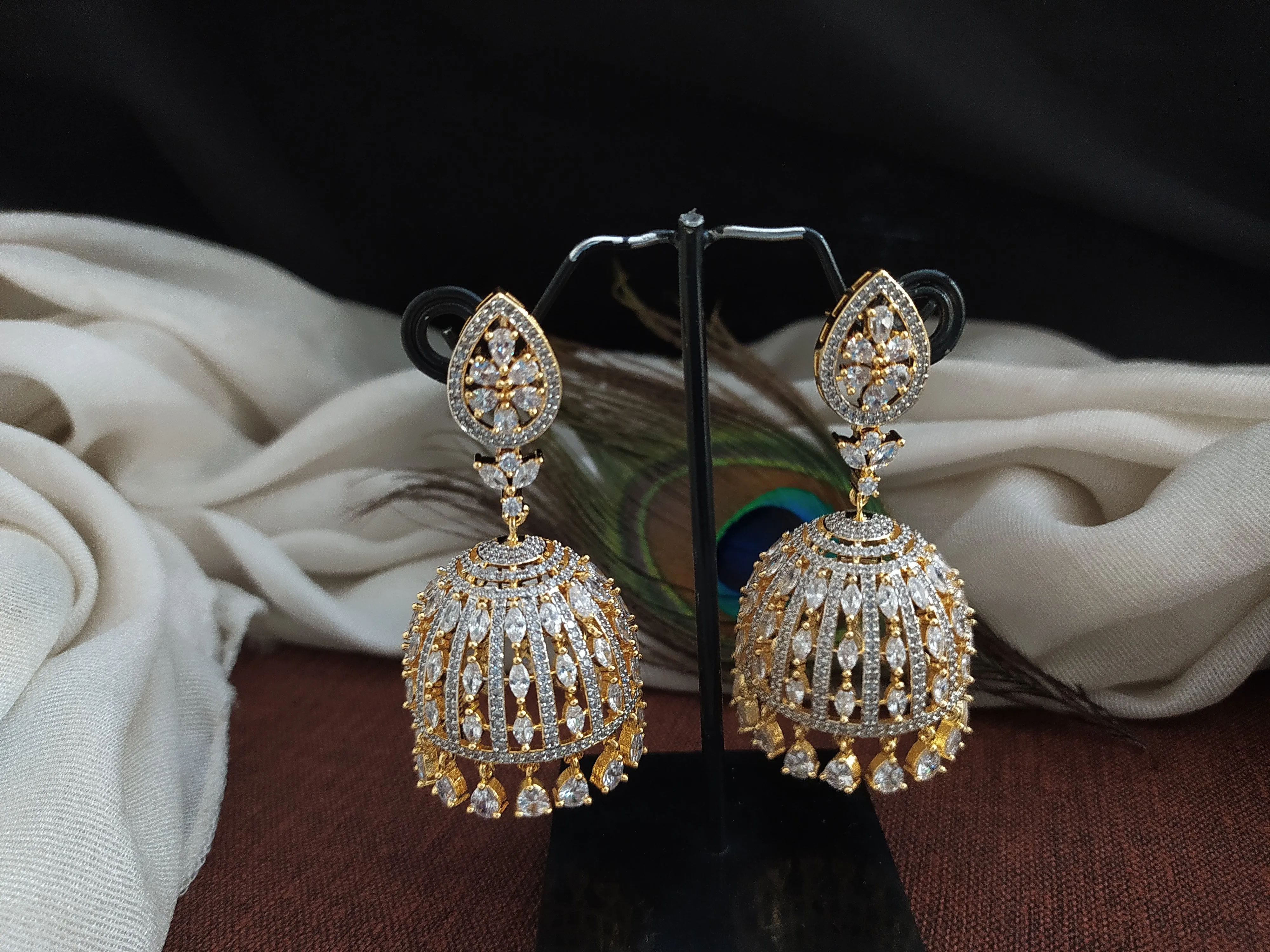 Radiant Zircon Stone Diamond Pear Studded Jhumki Earrings