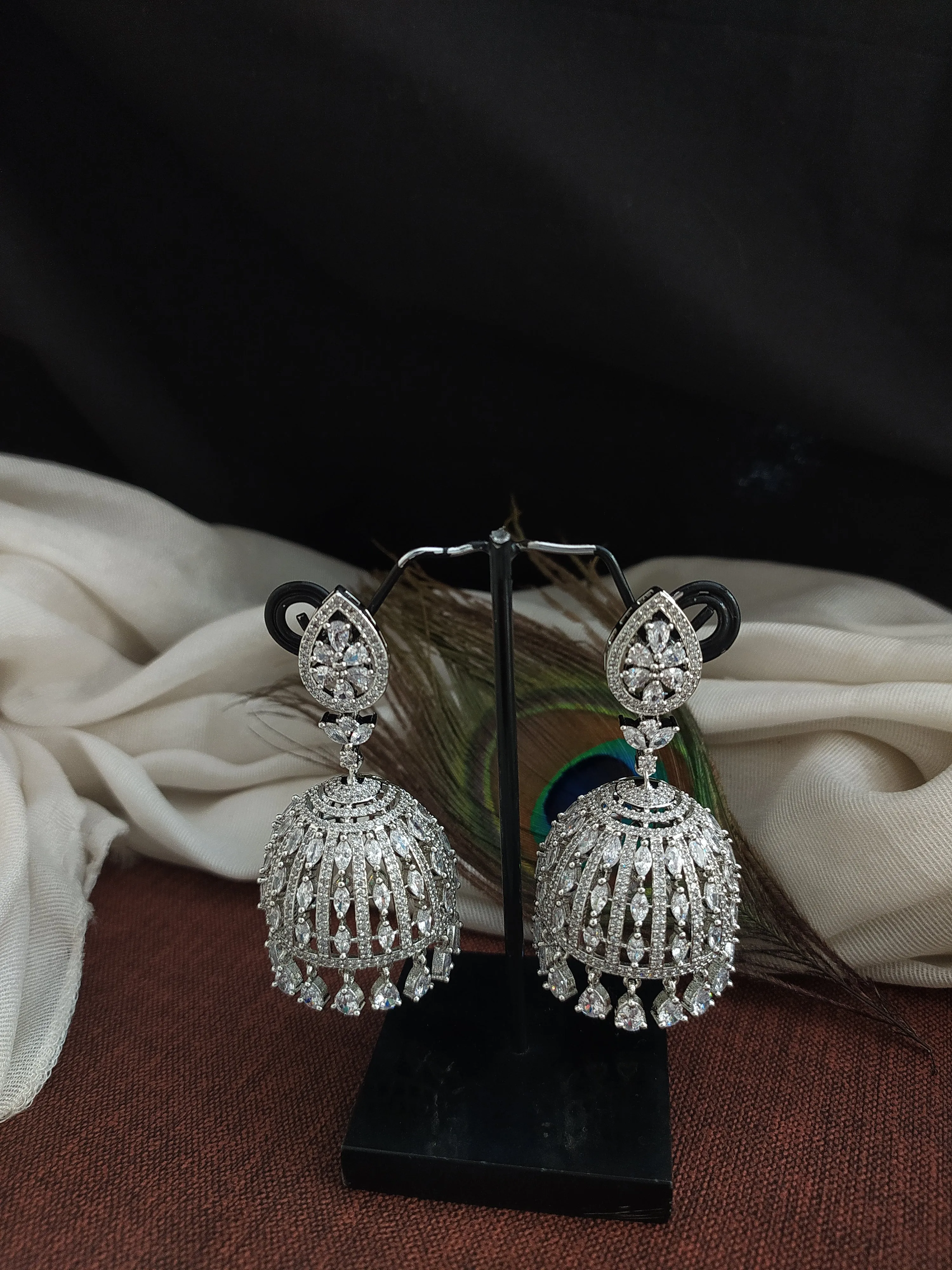 Radiant Zircon Stone Diamond Pear Studded Jhumki Earrings